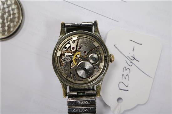 A gentlemans stainless steel Vertex military manual wind wrist watch.